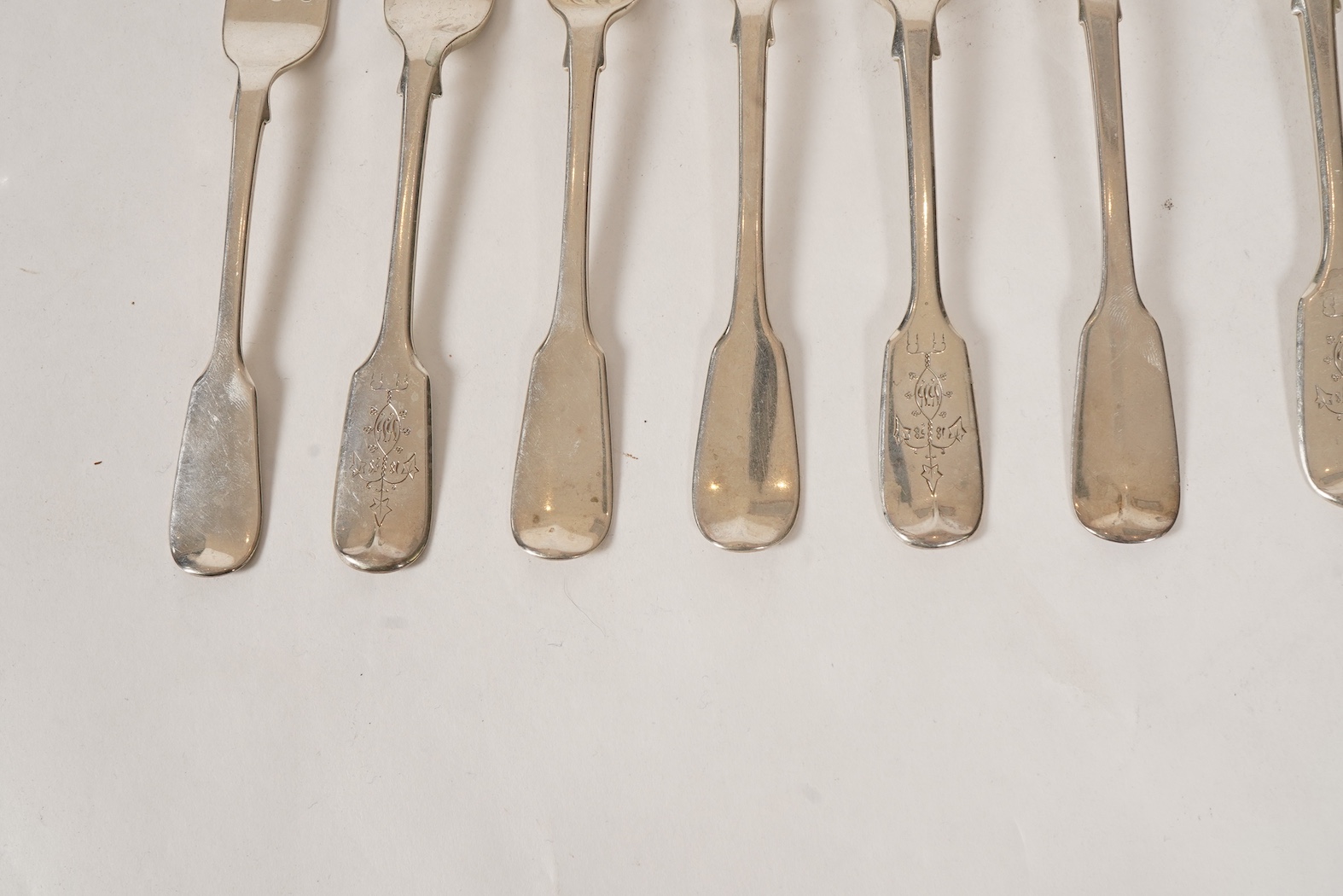 A set of twelve early Victorian provincial silver fiddle pattern table forks and six dessert forks by William Rawlings Sobey, Exeter, 1838, engraved 'Susanna Kingdon'
